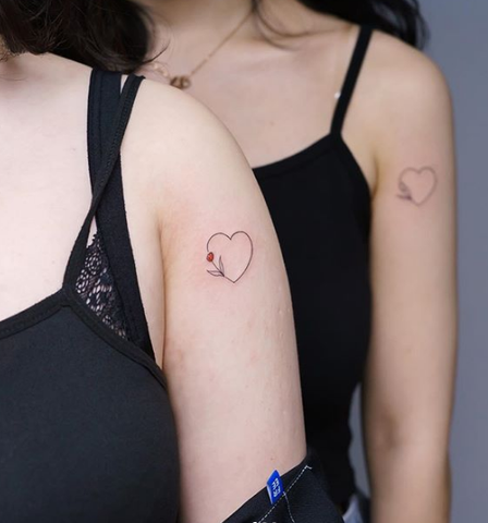 matching heart tattoo for girls