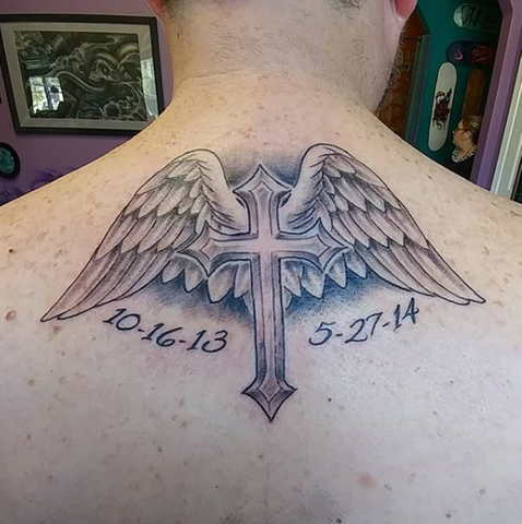 Cross Tattoo With Wings on back