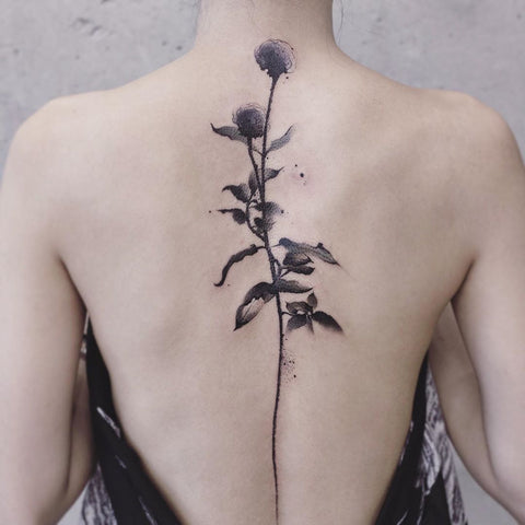 flower spine tattoo