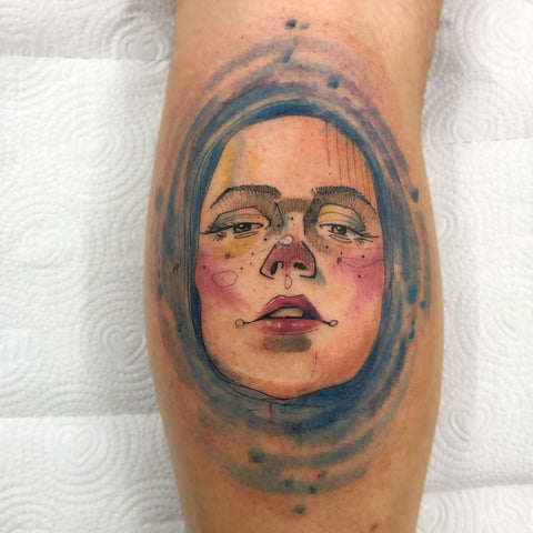 woman face watercolor tattoo