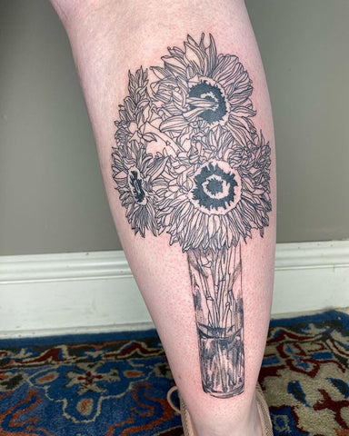 sun flower calf tattoo