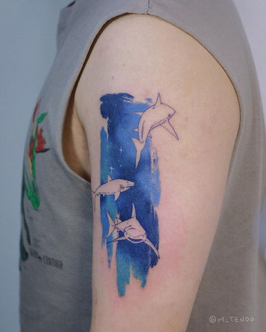 dolphin wattercolor tattoo