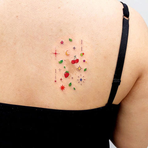 tiny moon apple dot star back tattoo