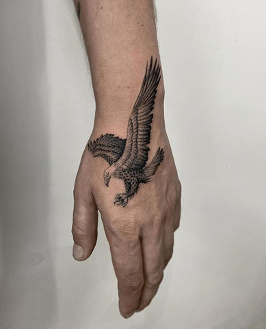 eagle tattoo on forearm