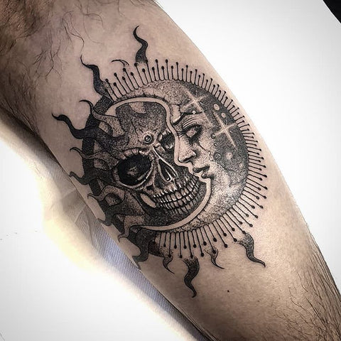 skull sun and moon forearm tattoo