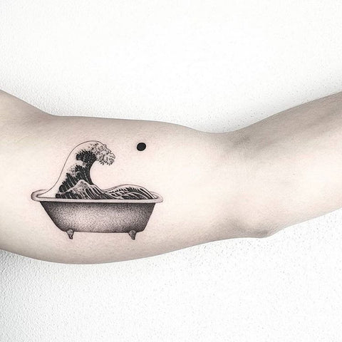 bath tub tattoo on arm