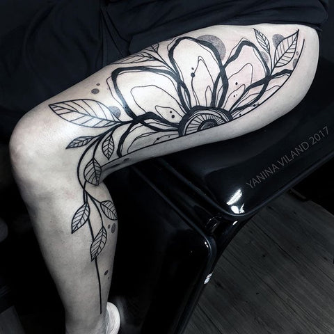 flower floral thigh tattoo