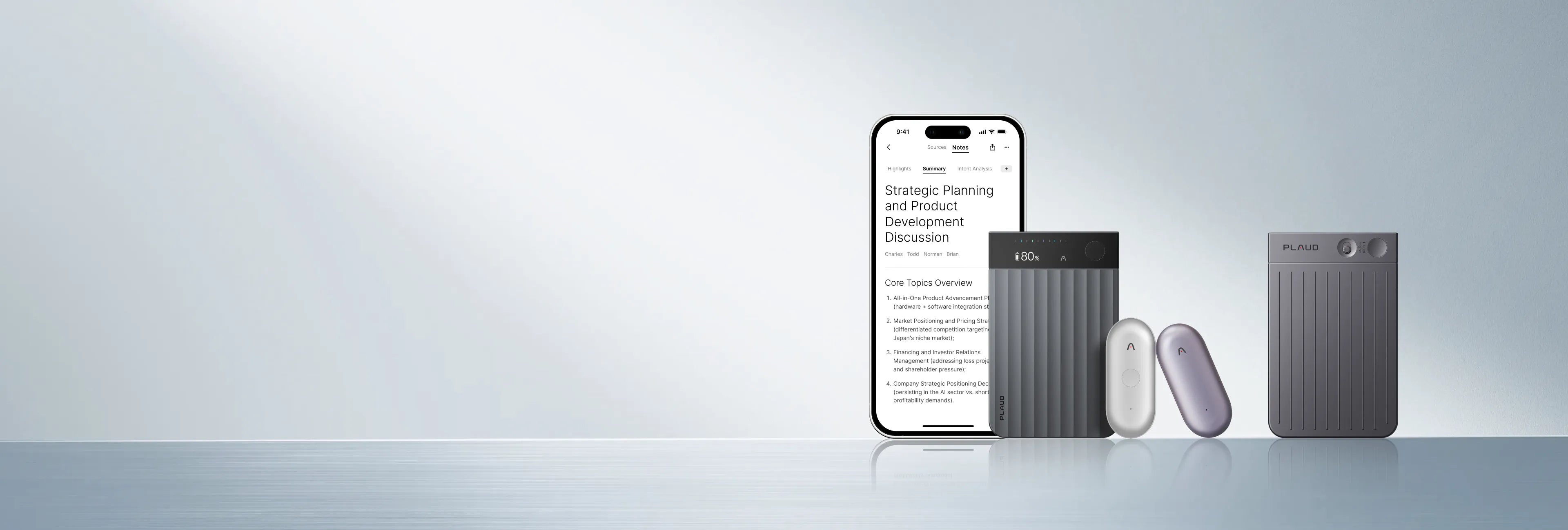 A clean product shot displays a smartphone showing the Plaud App, a dark gray Plaud Note Pro, an off-white Plaud NotePin, a l
