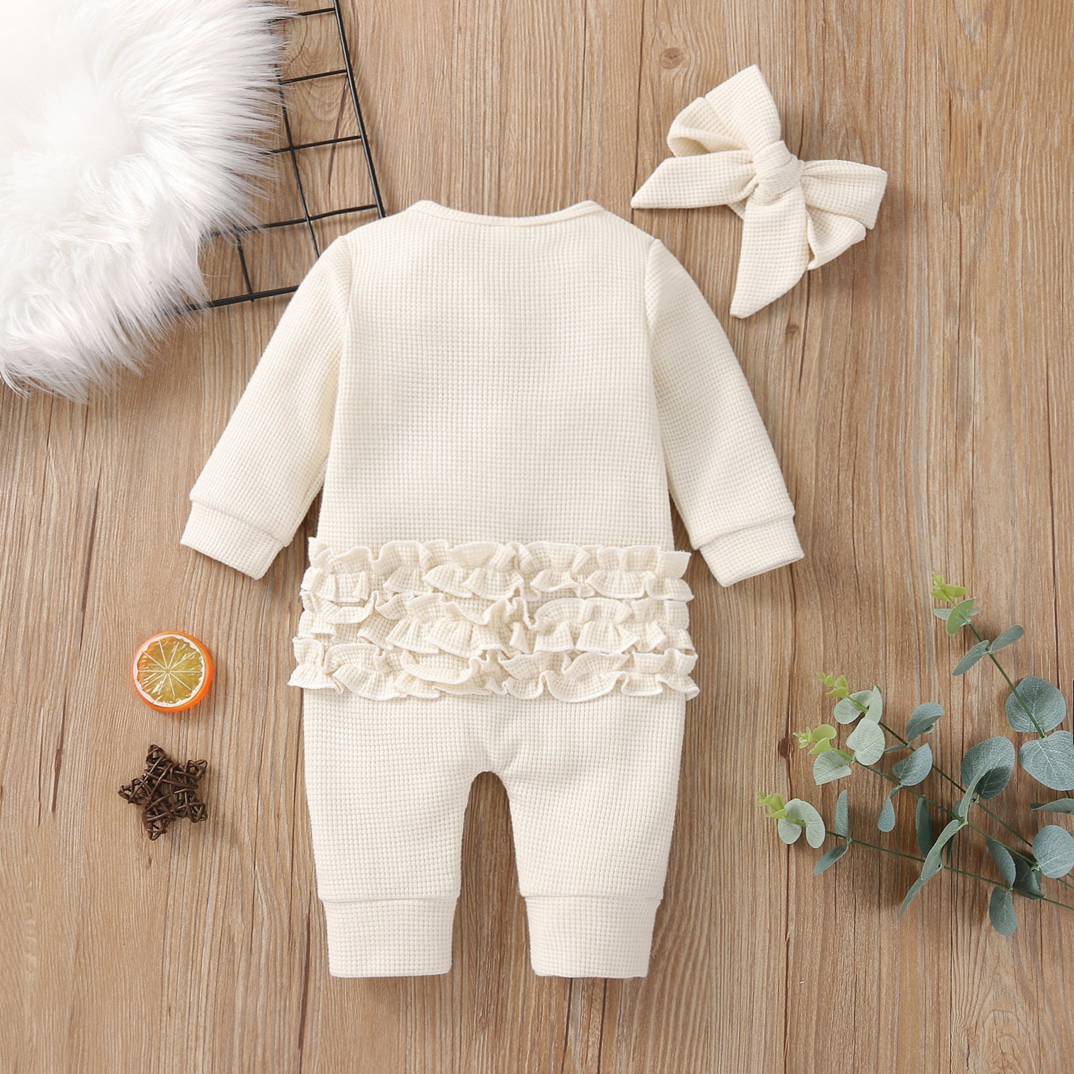 Solid Knit Ruffle Back Onesie with Bow