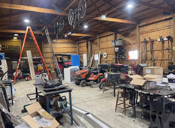 Hero series LED high bay lights in a worshop.