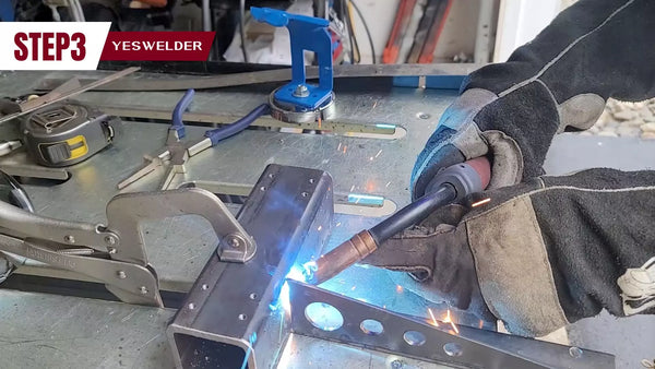Welding the triangle bracket to the top gantry plate