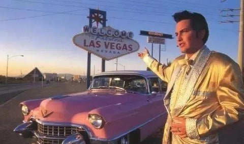 Elvis Presley with His Pink Cadillac