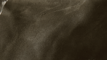 WATERPROOF MATERIAL of Woosir Vintage Leather Waterproof Waxed Canvas Backpack