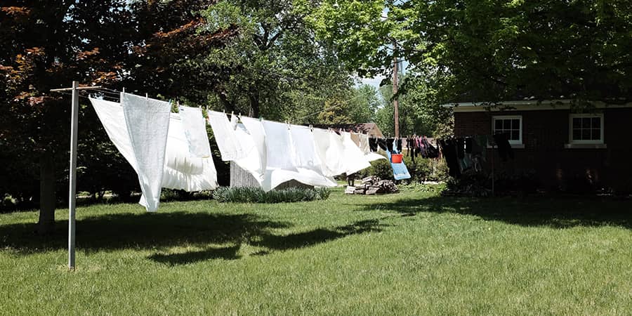 Hang drying clothes on a clothes line