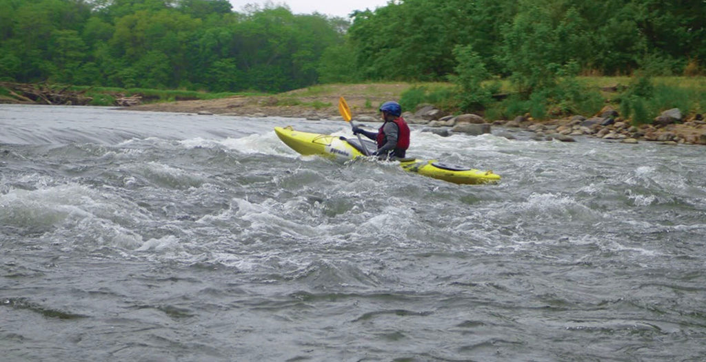 paddle boarding in Iowa lizard creek