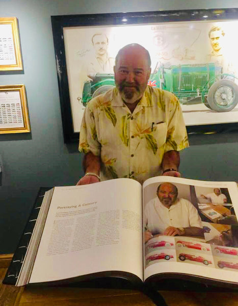 Phillip White with Bentley Centenary Book
