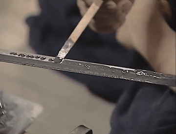 Applying clay to the katana edge and spine
