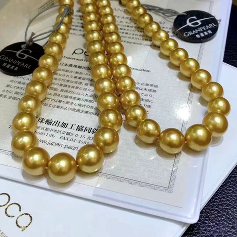 graduated golden south sea pearl earrings 16 inch
