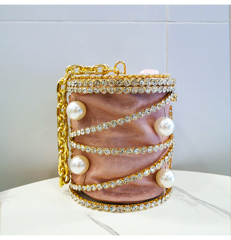 pink big pearl cage clutch