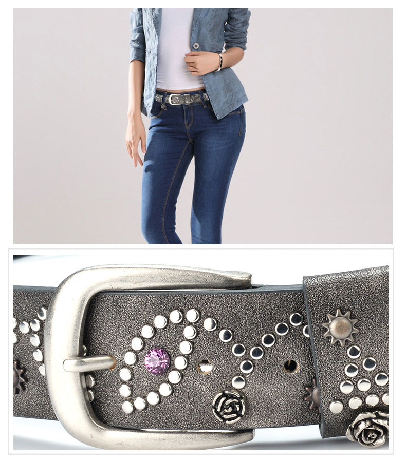 a women in jean wearing a beautiful rivets rhinestone studded leather belt