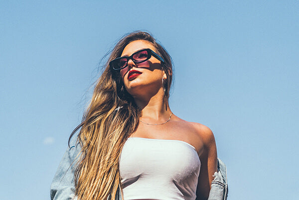 a girl wearing sunglasses