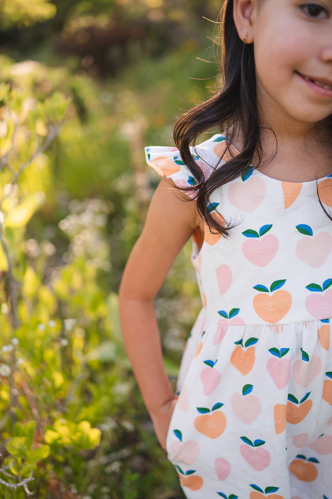 Macie Romper in Sweet Peach