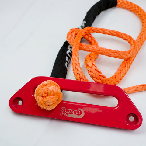 The Button Knot Winch Rope (BKWR) is made of UHMWPE. The knot protects the load-bearing portion of the rope by being the only exposed part on the fairlead, while only exposing the knot's head to potential damage. To enhance safety, a button knot serves as the attachment point for additional recovery equipment, eliminating metal in the system and reducing overall weight. Unlike hooks or steel wire ropes, button knots cannot cause injury if drawn over hard surfaces. Australian-made, tested