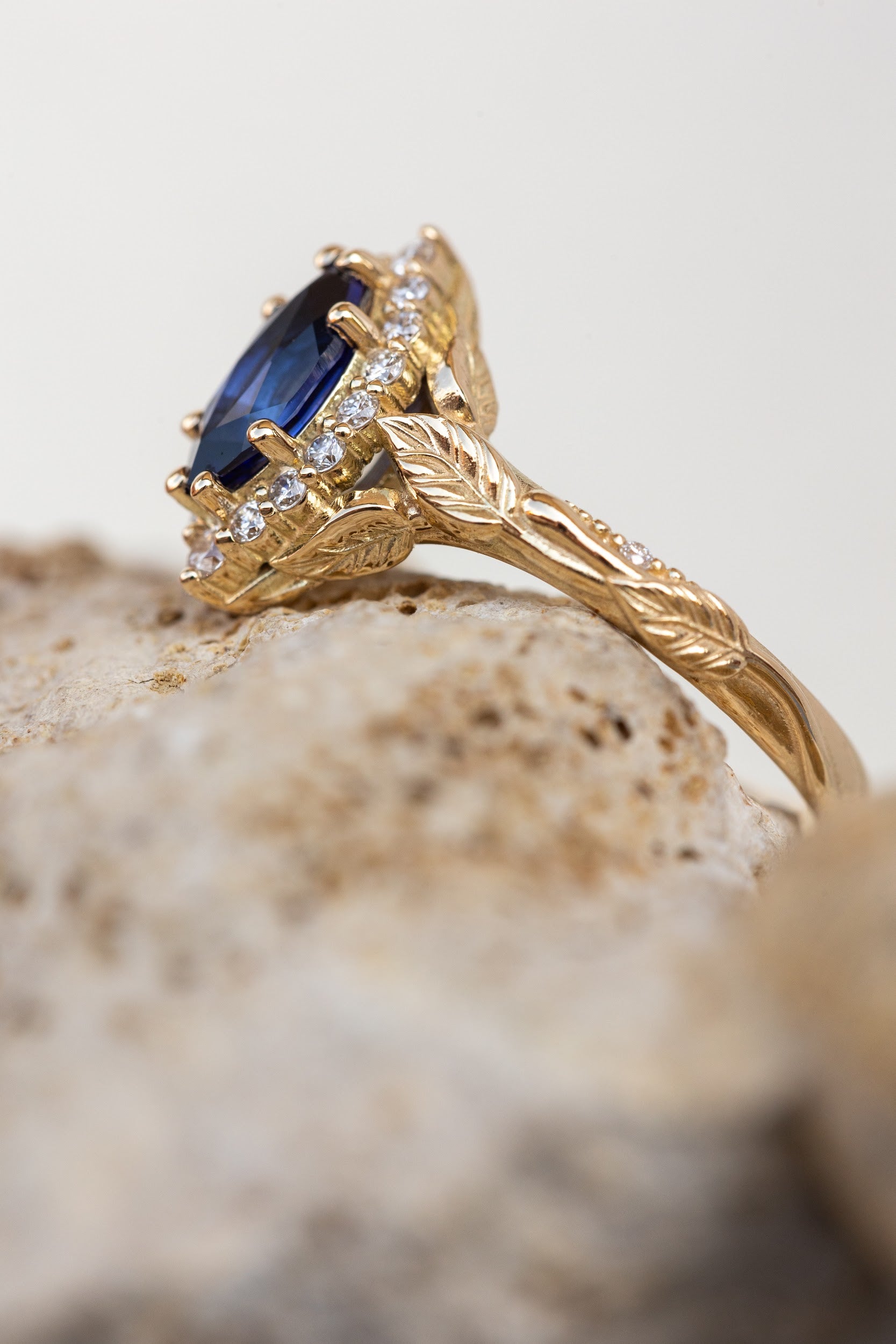 Dark blue lab sapphire engagement ring, gold proposal ring with marquise cut gemstone and diamond halo / Florentina