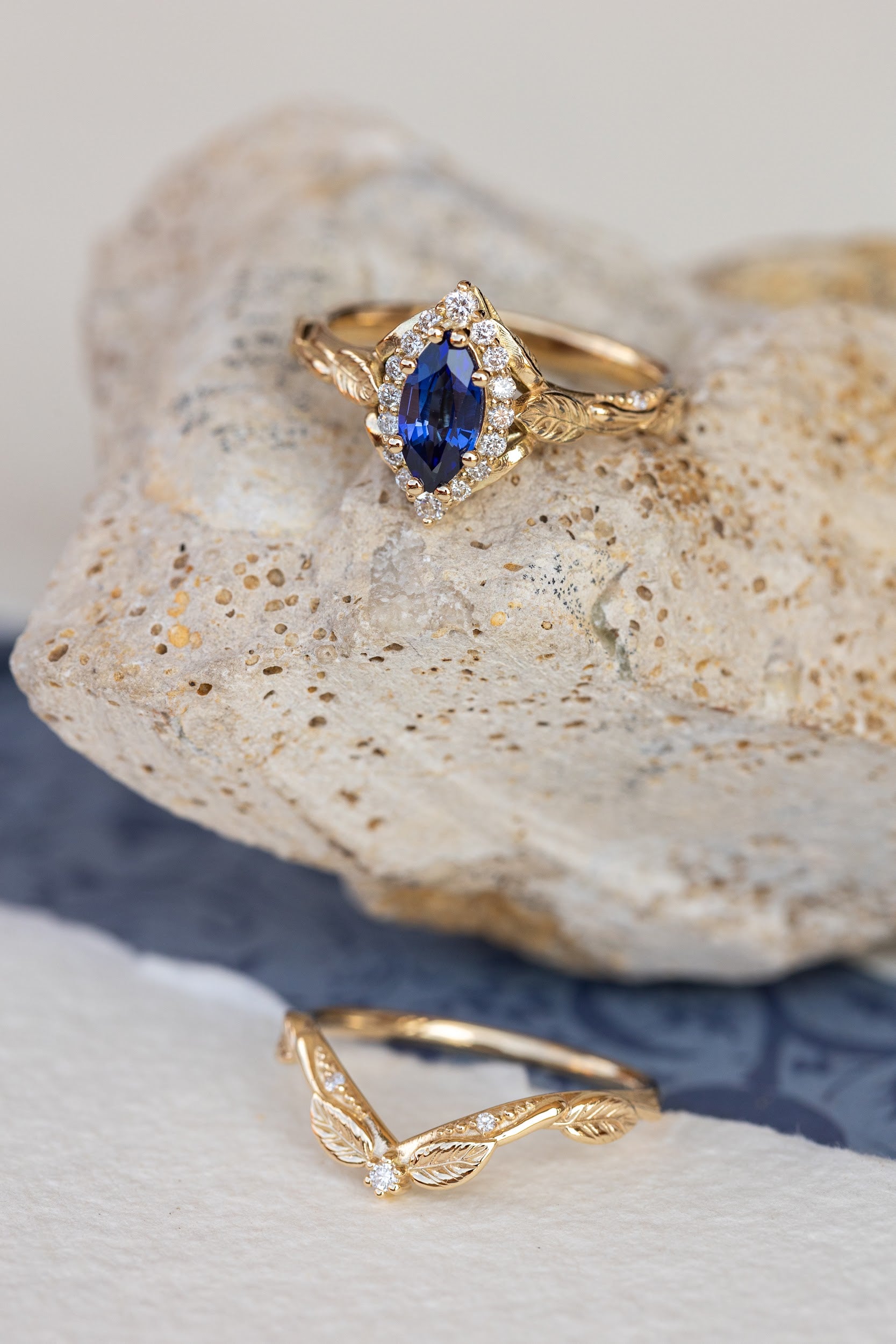 Dark blue lab sapphire engagement ring, gold proposal ring with marquise cut gemstone and diamond halo / Florentina