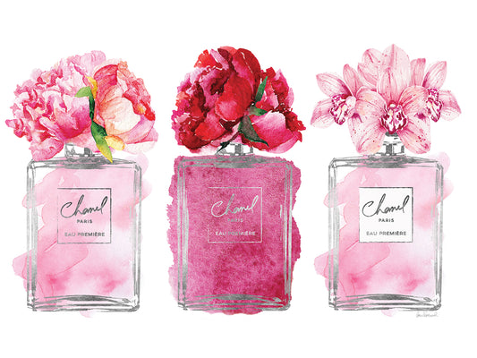 Three Perfume Bottles In Pink