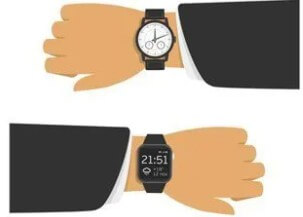 Right hand showing digital watch and left with an analog watch.