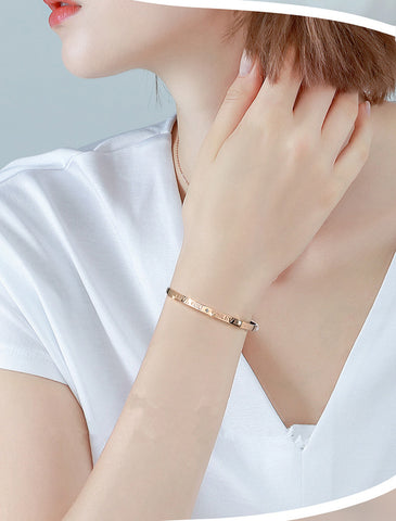Love vows engraved on each other's wrists
