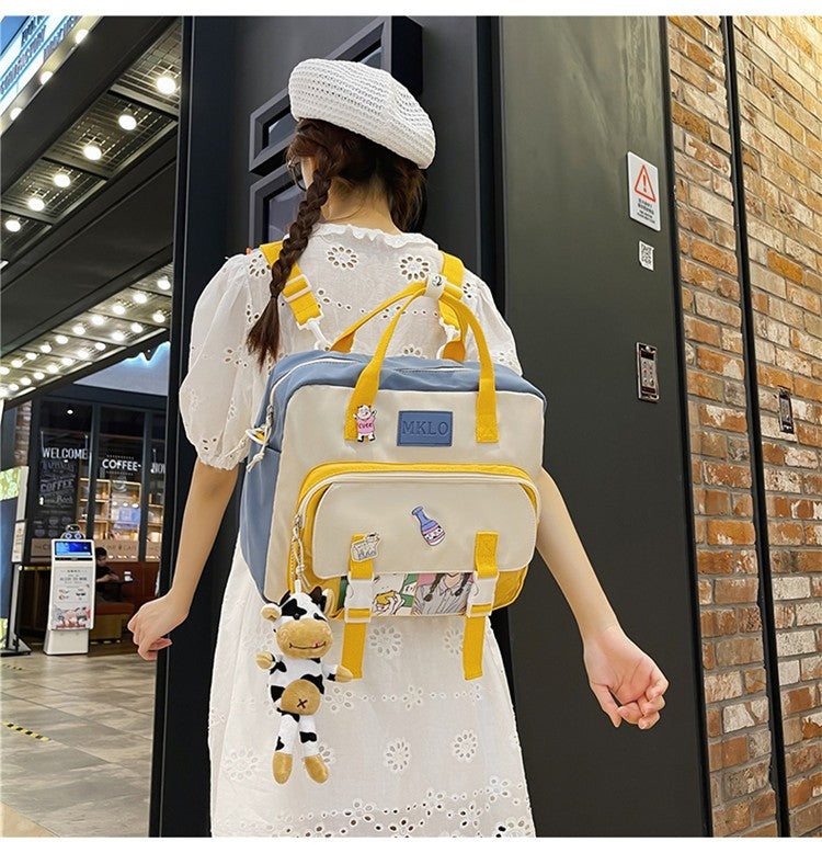 Gothslove Womens Backpack Trendy Nylon Large Capacity School Bags For Girls Cute Doll Pendant Contrast Color Messenger Bookbag