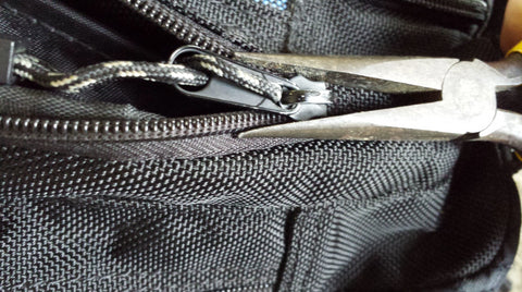 How to get a backpack zipper unstuck?