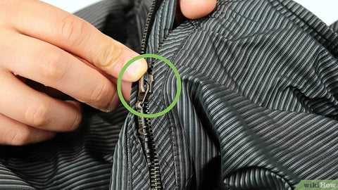 How to get a backpack zipper unstuck?