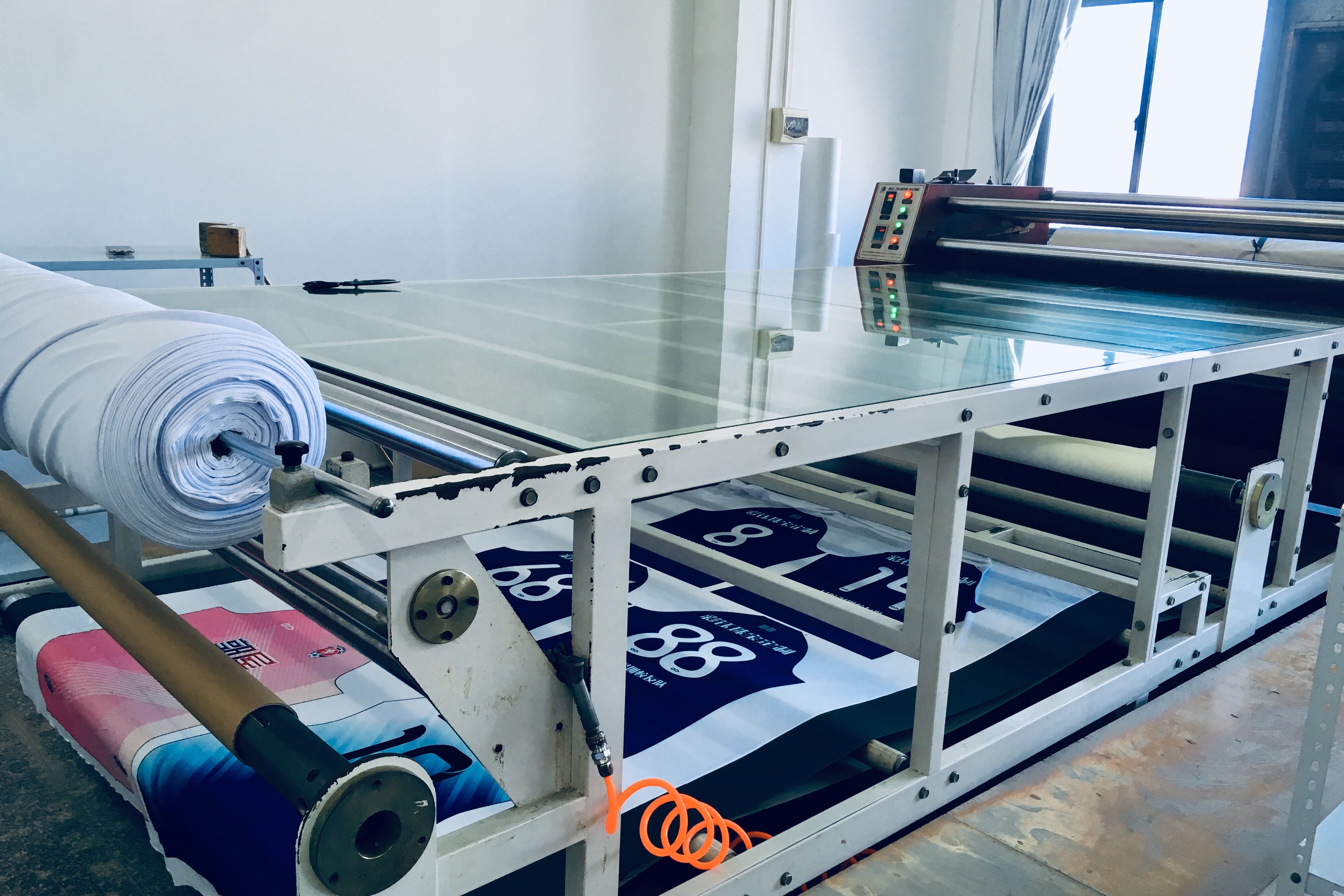 Sublimation printing is a printing technique that transfers a design into a material or fabric using ink and heat. This form of printing is special in that it allows whole garment prints — designs that go seam-to-seam.
