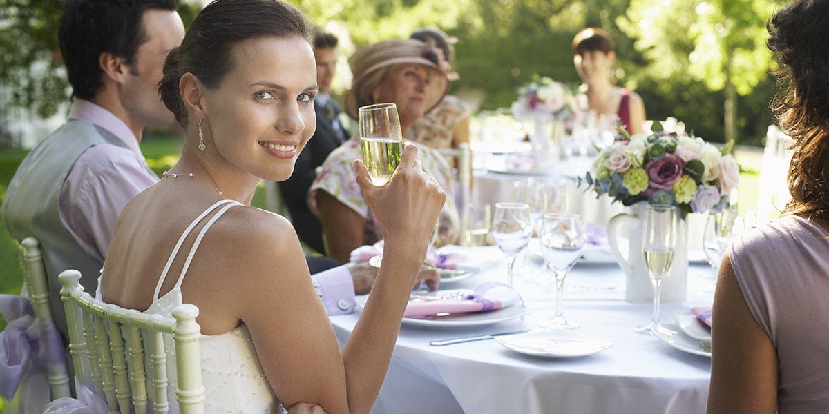 woman holding wine glass