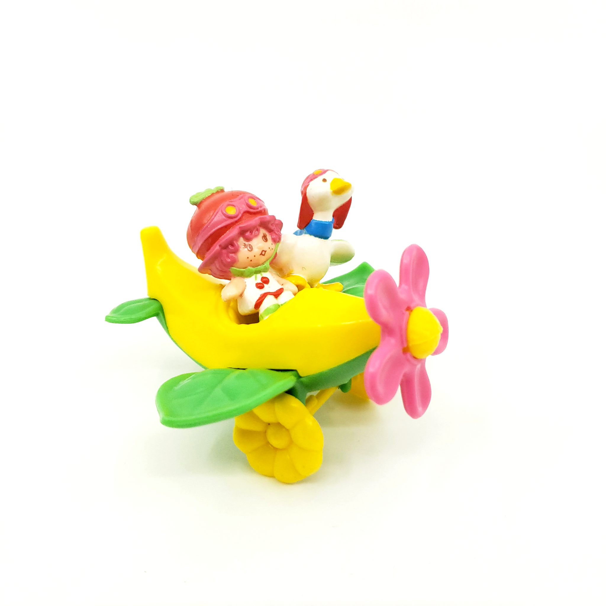 Vintage Miniature Cherry Cuddler Flying an Airplane