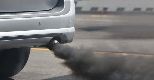 Black smoke coming from a car's exhaust pipe