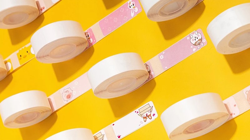 Assorted Phomemo D30 label paper rolls with colorful and cartoon designs