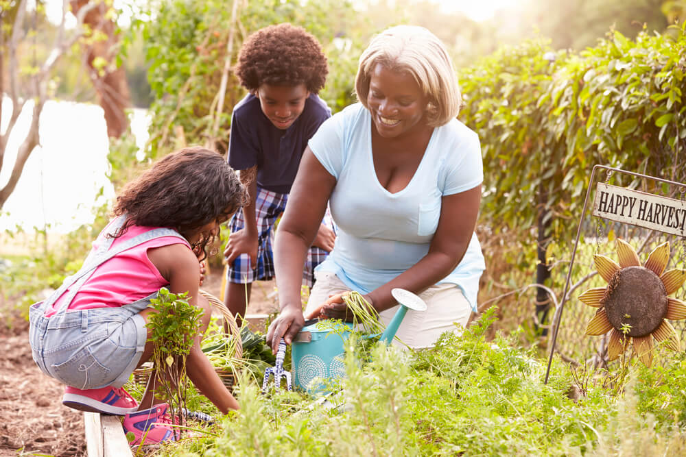 Mother and two kids spark joy in outdoor spaces