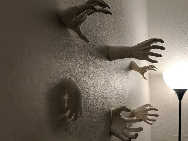 Modello 3D Mani che Si Protendono dal Muro