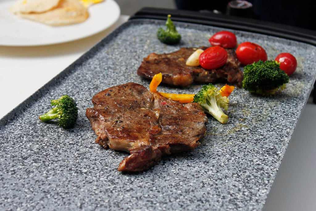 Gray griddle with food