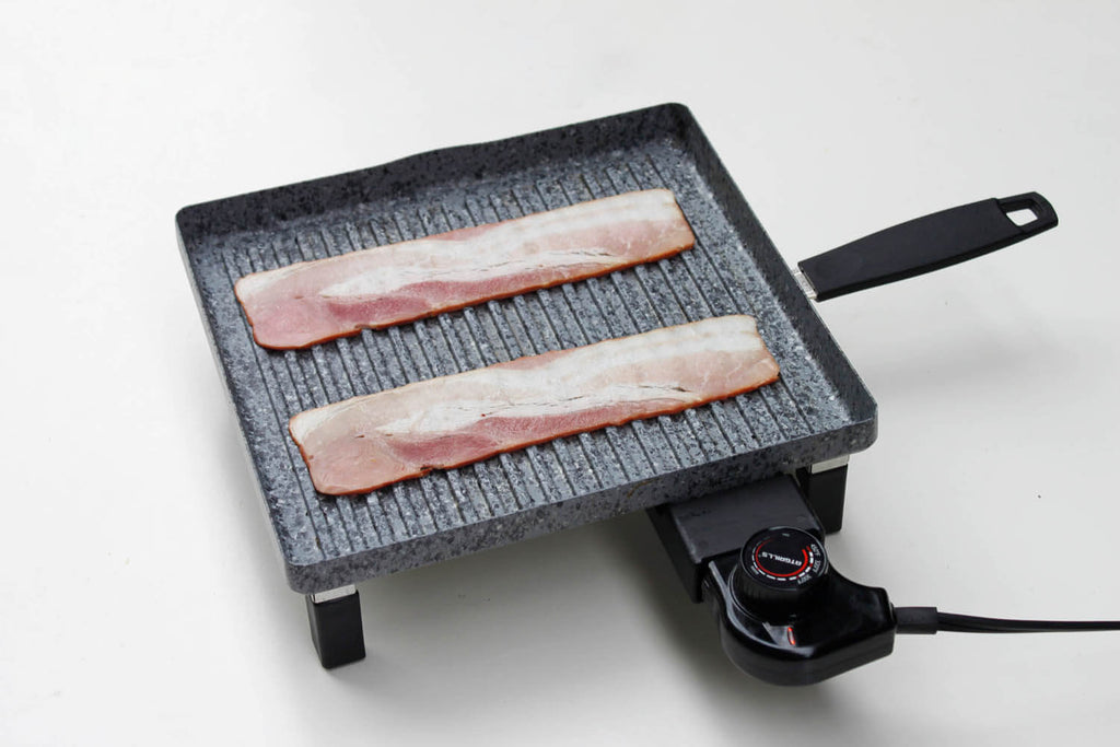 Grilling bacons on Atgrills electric grill pan