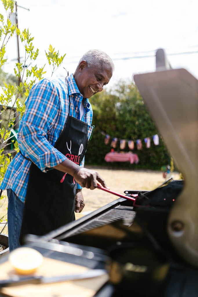 Man grilling on outdoor grills