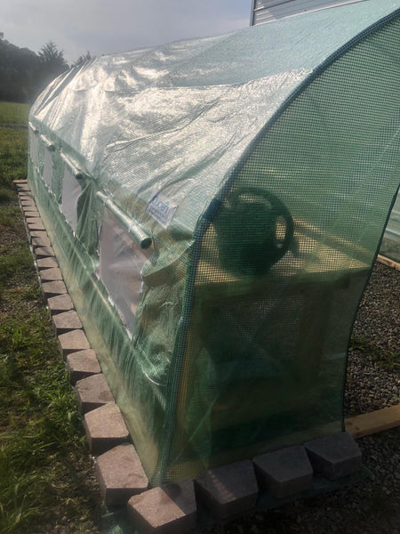 Secure the Quictent greenhouse with brick