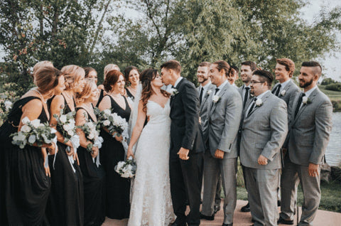 Black bridesmaid dresses with grey suits