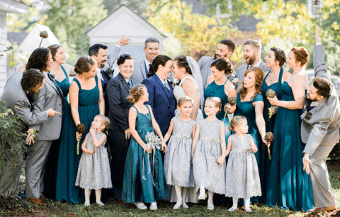 Teal bridesmaid dresses with grey suits