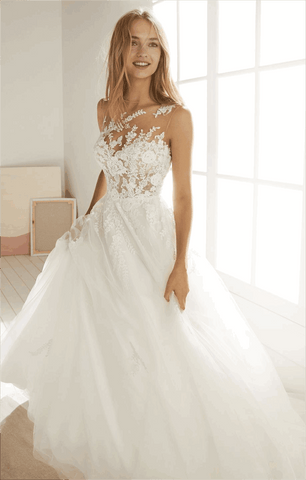 Try on the wedding dresses under natural light.