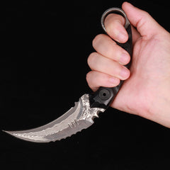 Empuñadura invertida de karambit